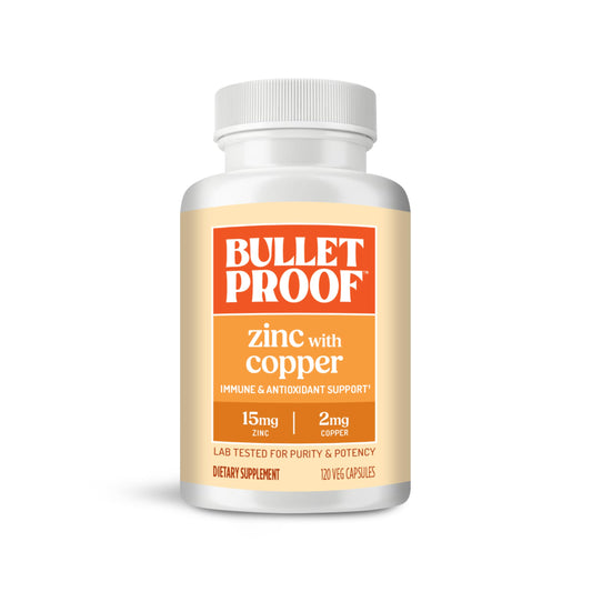 Bulletproof frasco frontal mostrando 120 cápsulas para apoyo inmunitario