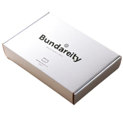 Bundariety batido en mano mostrando 30g proteína, ideal post-entreno