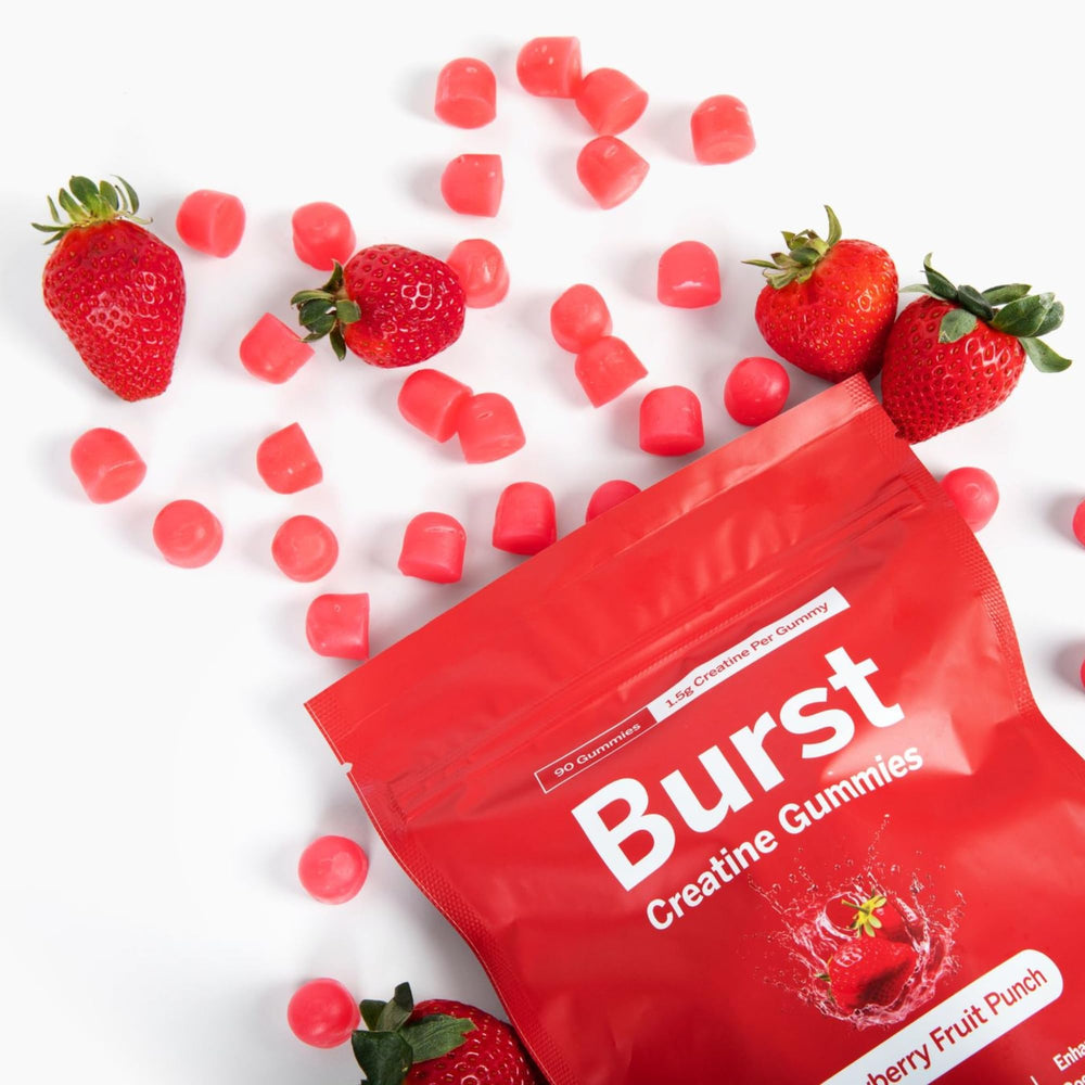 Burst Creatine gomita en mano para comparar tamaño y facilidad de uso
