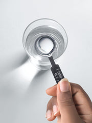 Carlyle imagen de laboratorio y frasco, refleja pruebas y control de calidad