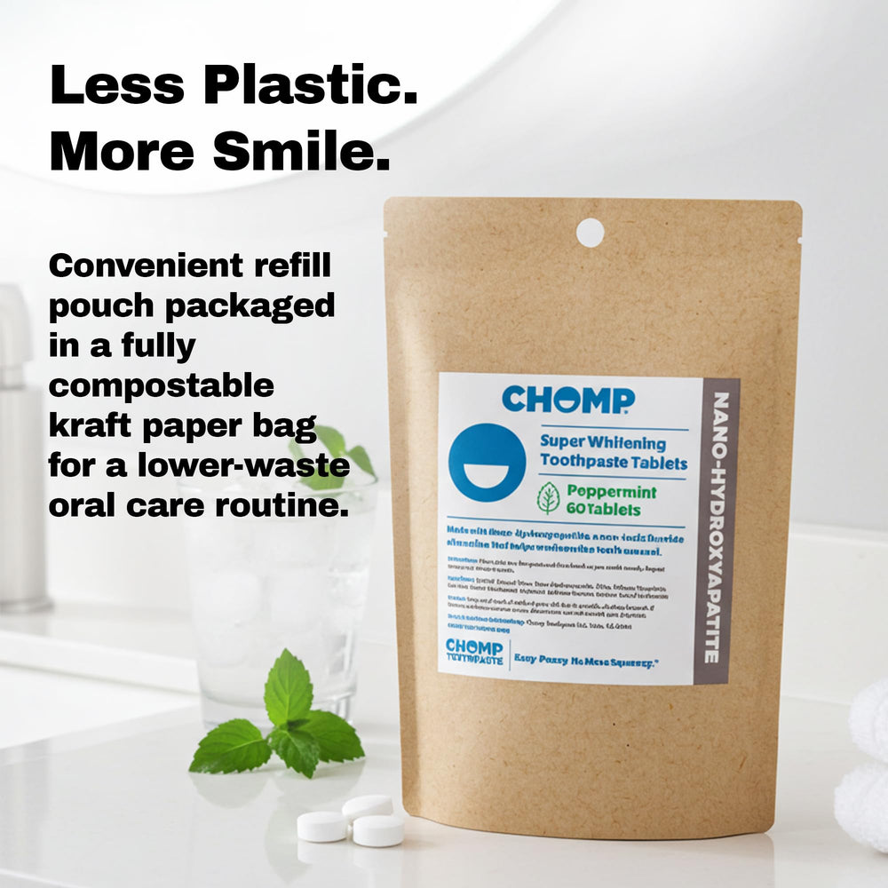 CHOMP tableta junto a monedas para escala, tamaño portátil y dosificado
