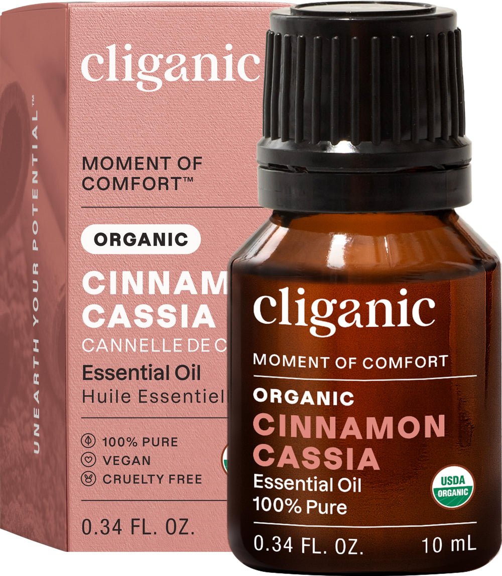 Cliganic frasco delantero de aceite canela Cassia mostrando etiqueta orgánica y pureza