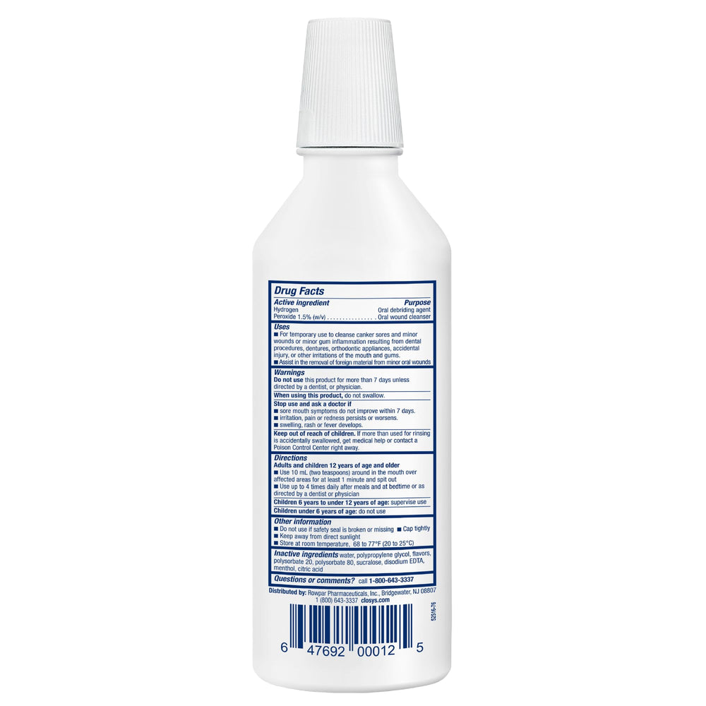 Botella CloSYS en ambiente de baño ordenado, transmite cuidado bucal profesional