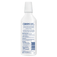 CloSYS junto a cepillo de dientes para comparar tamaño y dosificación práctica