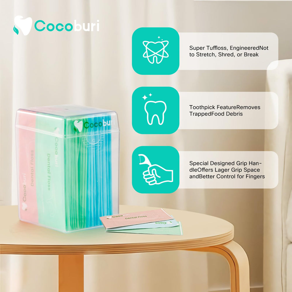 COCOBURI flosser sostenido en mano mostrando tamaño portátil