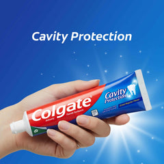 Colgate tubo dentro de un neceser que demuestra conveniencia en viaje
