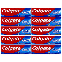 Colgate frontal paquete de 10 tubos travel size mostrando conveniencia para viajes