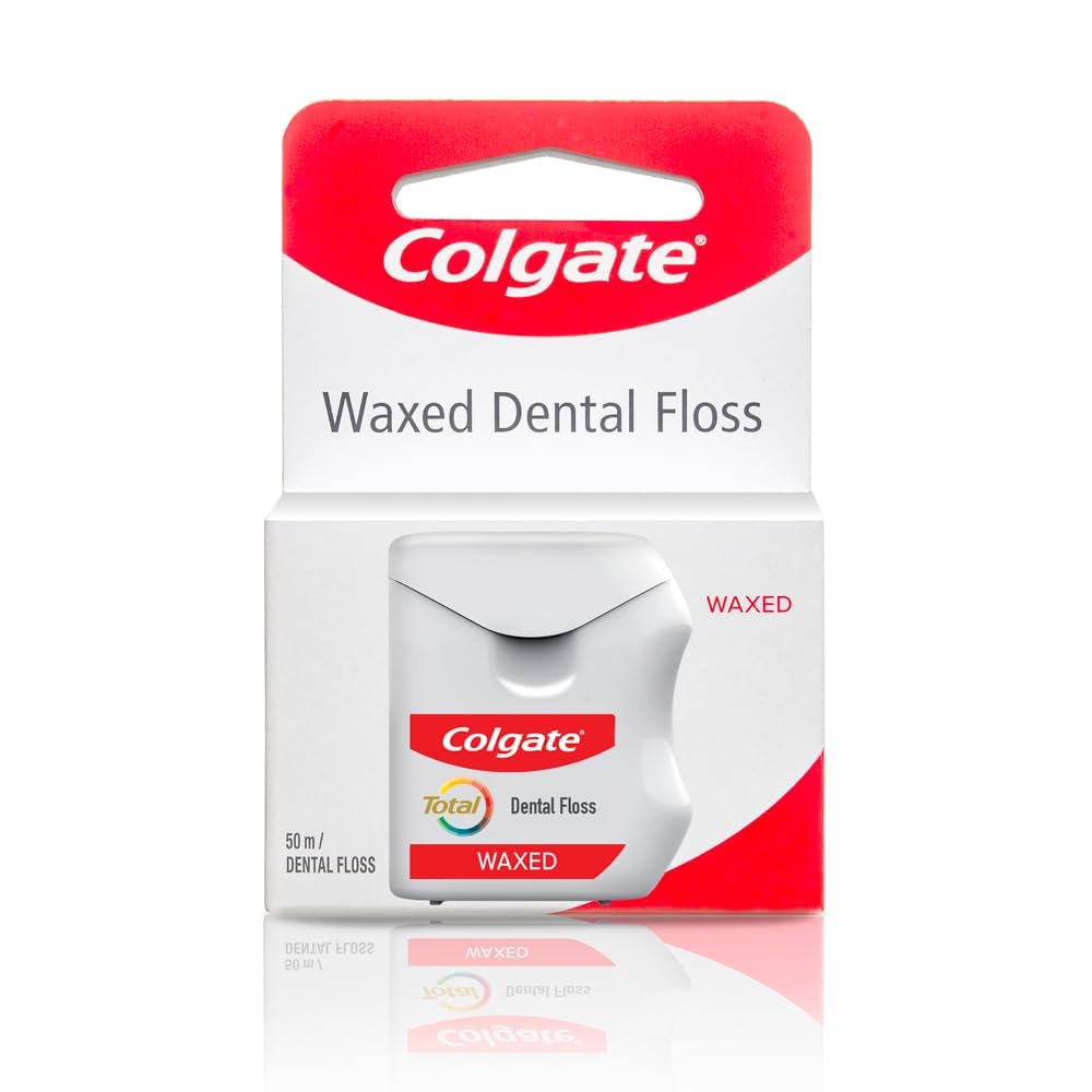 Colgate hilo dental frente del paquete mostrando 2 unidades y beneficio frescura