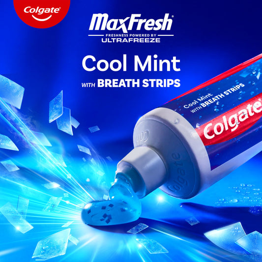 Colgate MaxFresh tubo de 1 oz cerca destacando la boquilla práctica