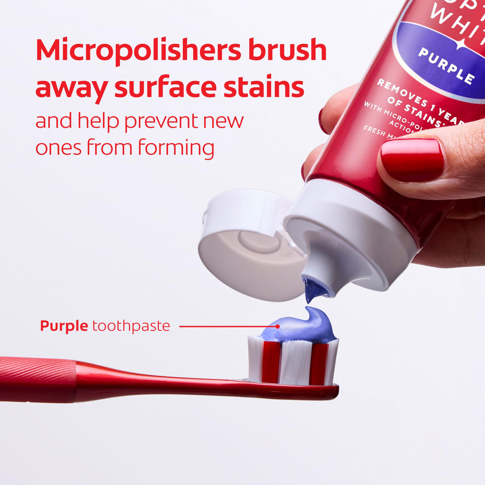Colgate Optic White Purple tamaño comparado con cepillo para referencia práctica
