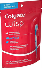 Colgate Optic White Wisp frente del paquete, mini cepillo listo para viaje