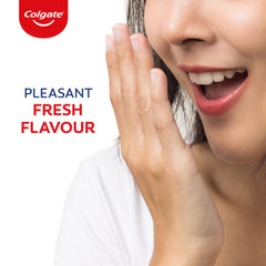 Colgate PerioGard en baño moderno ilustrando uso diario en rutina