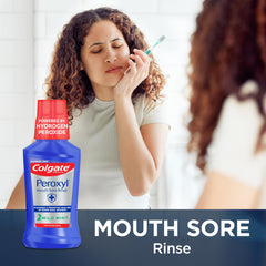 Colgate Peroxyl etiqueta legible indicando 1,5% peróxido y ventaja antiséptica