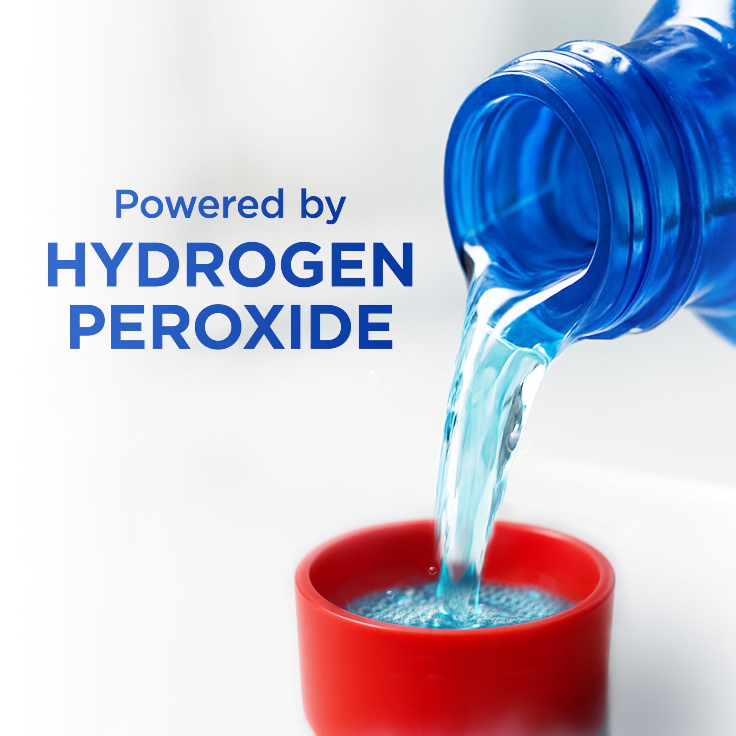 Colgate Peroxyl comparación de tamaño botella 500 ml para escala doméstica