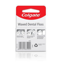 Colgate detalle del hilo encerado que muestra deslizamiento suave
