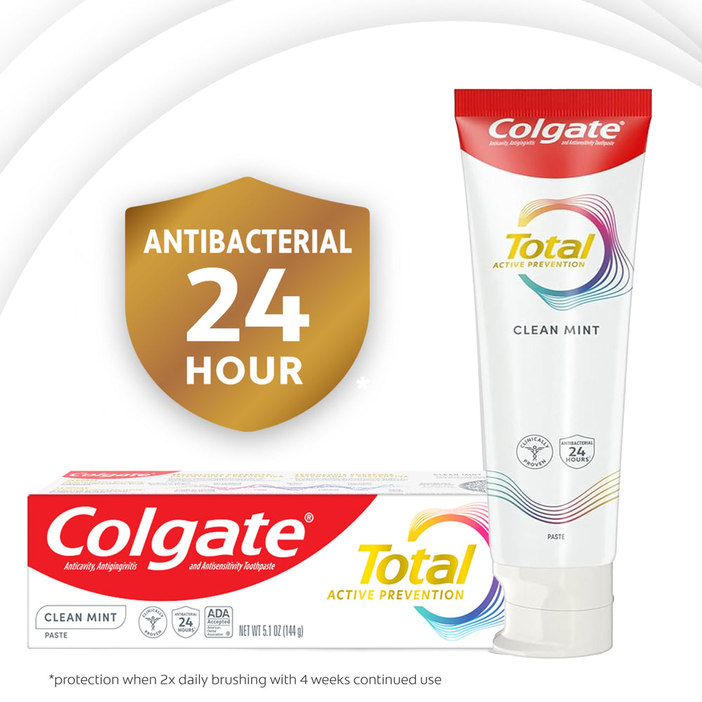 Colgate Total tubo junto a regla para comparación de tamaño y uso