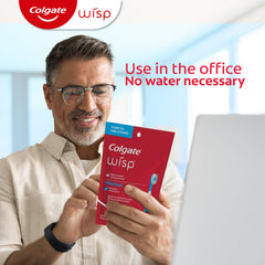 Colgate Wisp comparación de tamaño en bolso, portátil y práctico