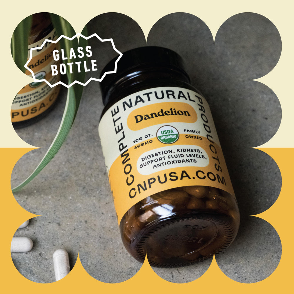 Complete Natural Products cápsulas junto a regla para comparar tamaño