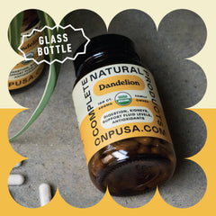 Complete Natural Products cápsulas junto a regla para comparar tamaño