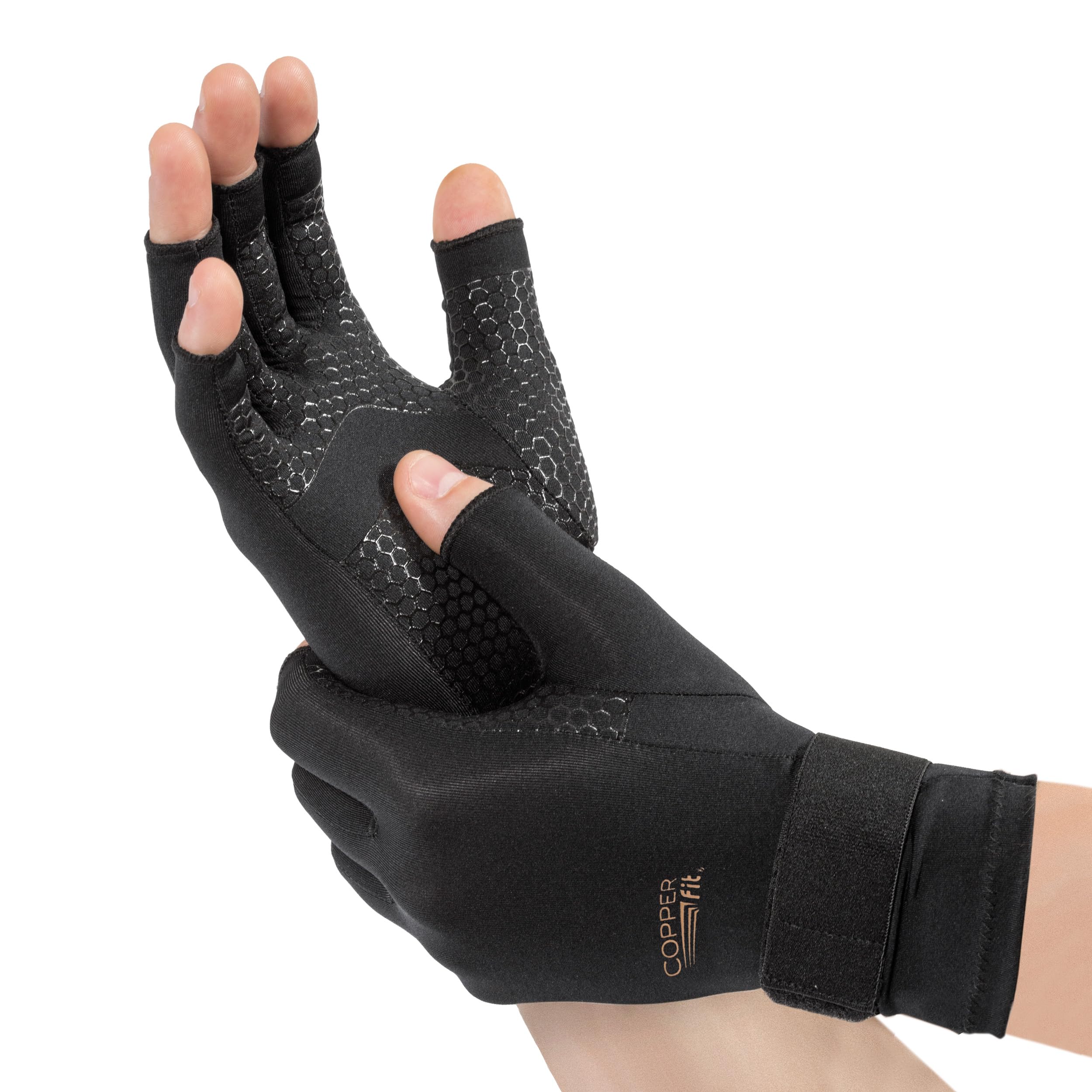 Copper Fit vista frontal del empaque mostrando guantes L/XL y beneficios