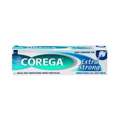 Tubo Corega 40g comparado con mano para visualizar tamaño y duración estimada