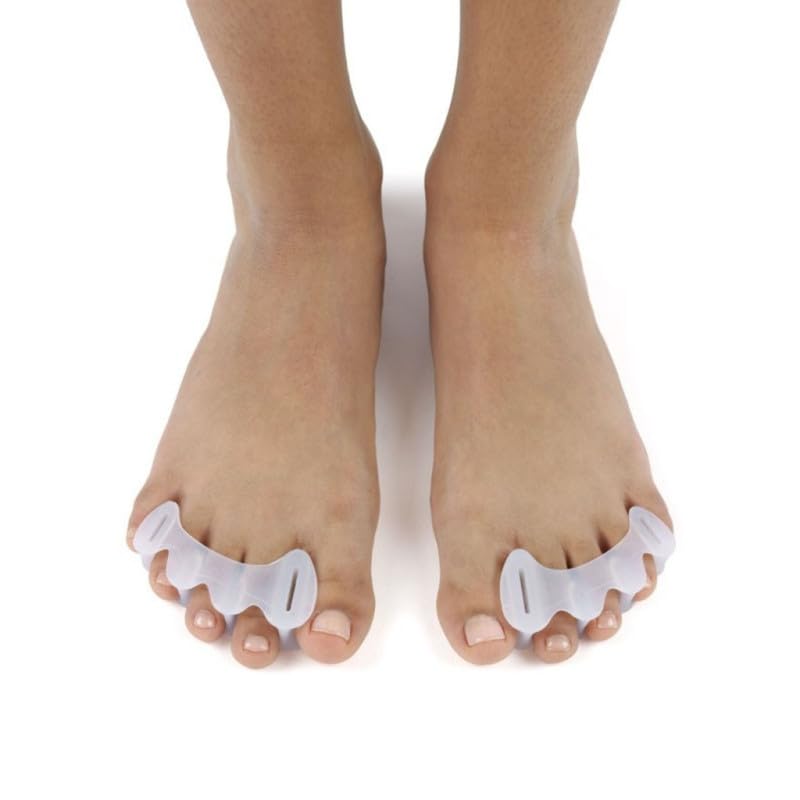 Correct Toes en uso sobre pie descalzo mostrando alineación natural