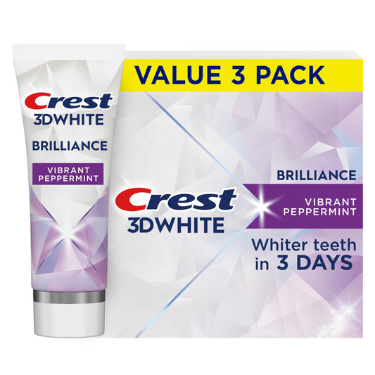 Crest 3D White frontal del empaque mostrando el pack de tres tubos y beneficio de blanqueamiento