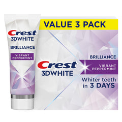 Crest 3D White frontal del empaque mostrando el pack de tres tubos y beneficio de blanqueamiento