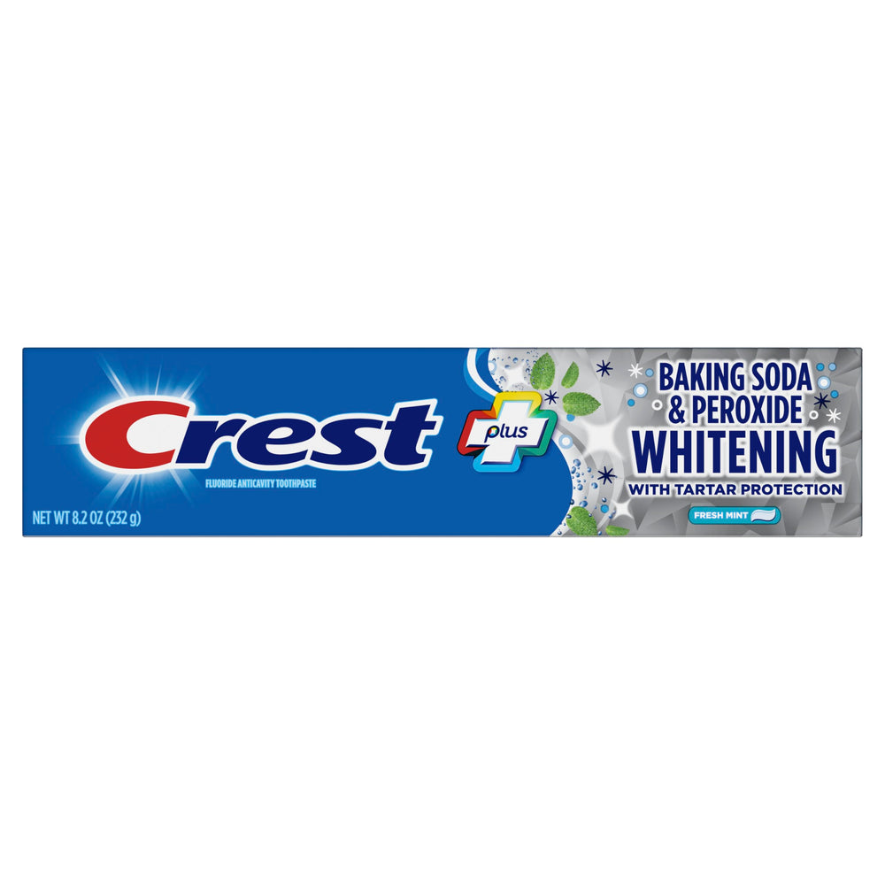 Crest tubo sobre superficie con referencia de tamaño 8.2 oz visible