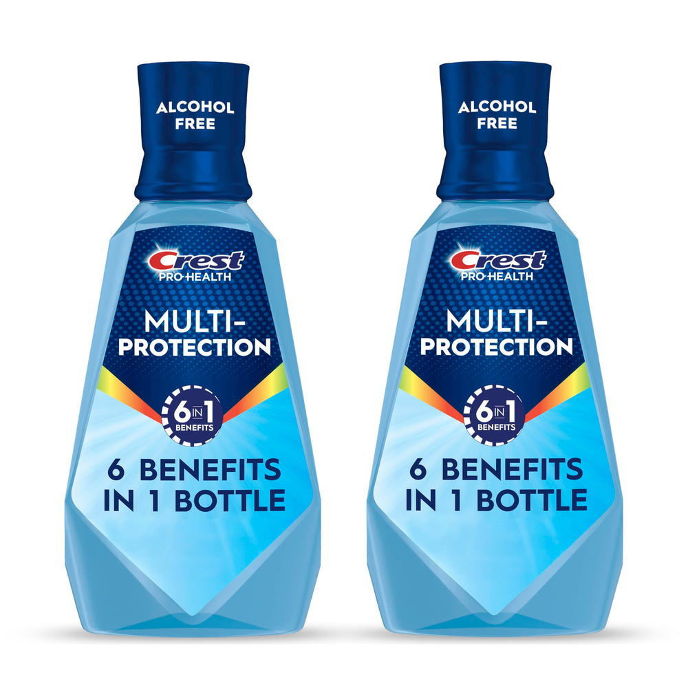 Crest botella frontal mostrando etiqueta y protección bucal