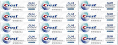Crest frasco de viaje frente mostrando etiqueta y beneficio limpieza profunda