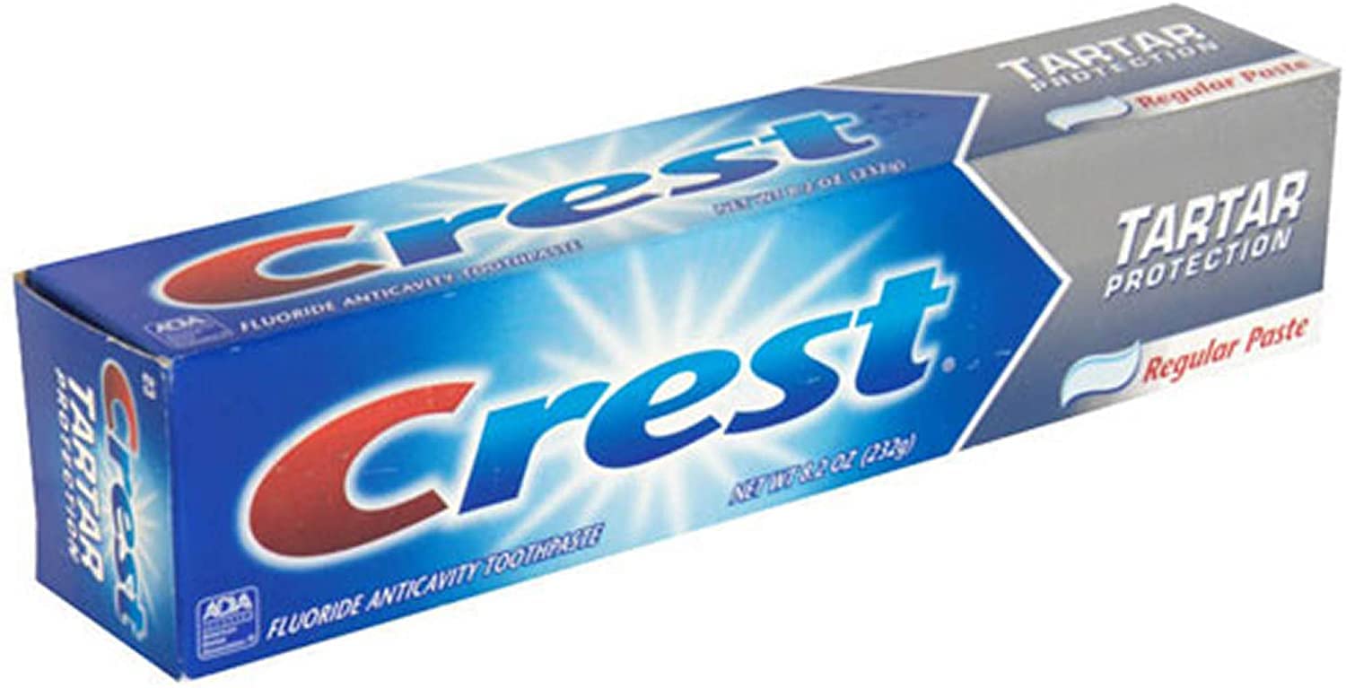 Crest primer plano de la textura de la pasta mostrando partículas pulidoras efectivas