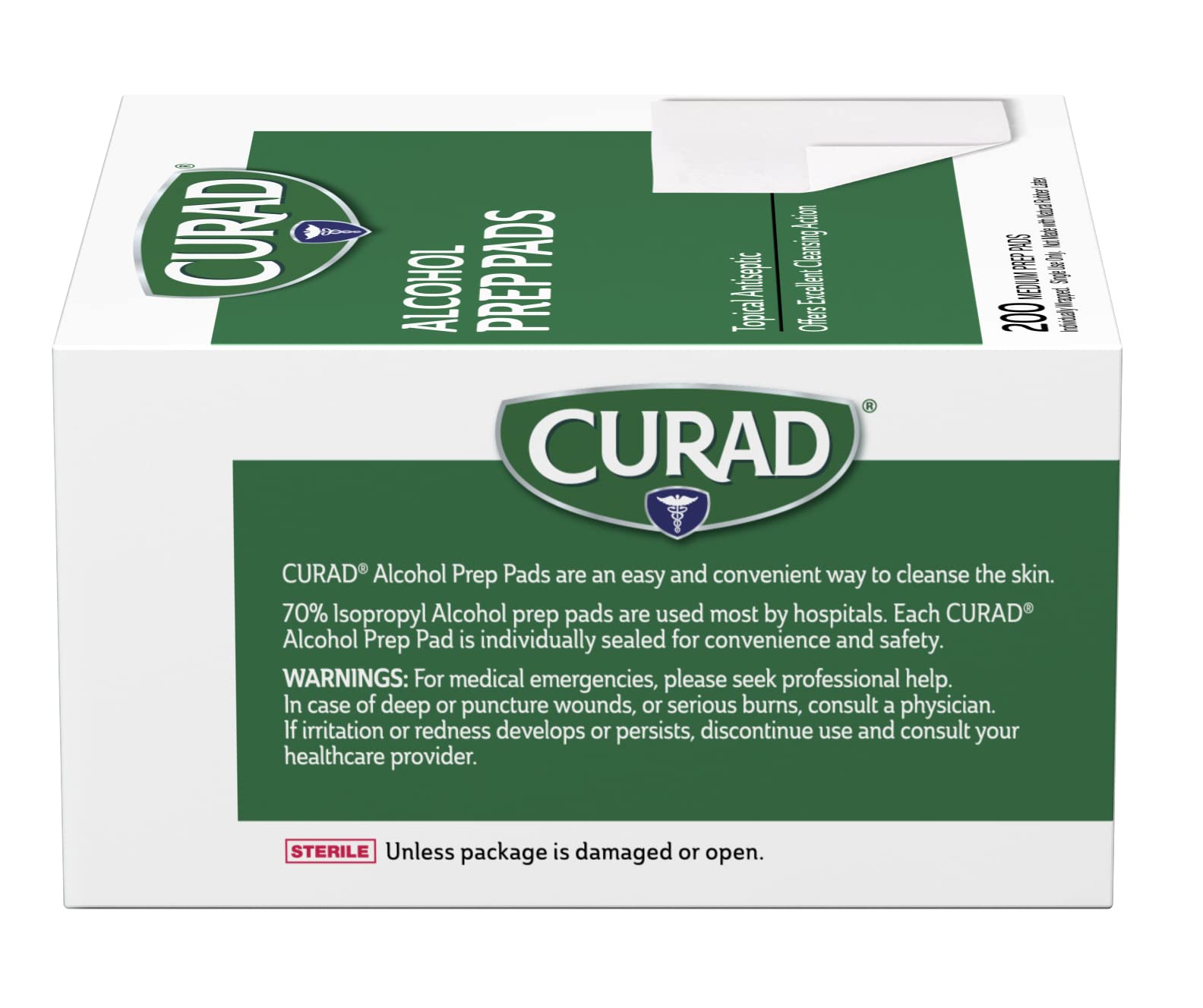 Curad almohadilla junto a una moneda para comparar tamaño mediano