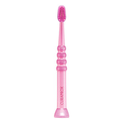 Curaprox cepillo baby frente del empaque mostrando color rosa y diseño seguro