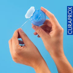Comparación de tamaño Curaprox DF 820 con cepillo para referencia práctica