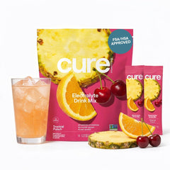 Cure Hydration paquete frontal Tropical Punch mostrando 14 sobres y beneficio práctico