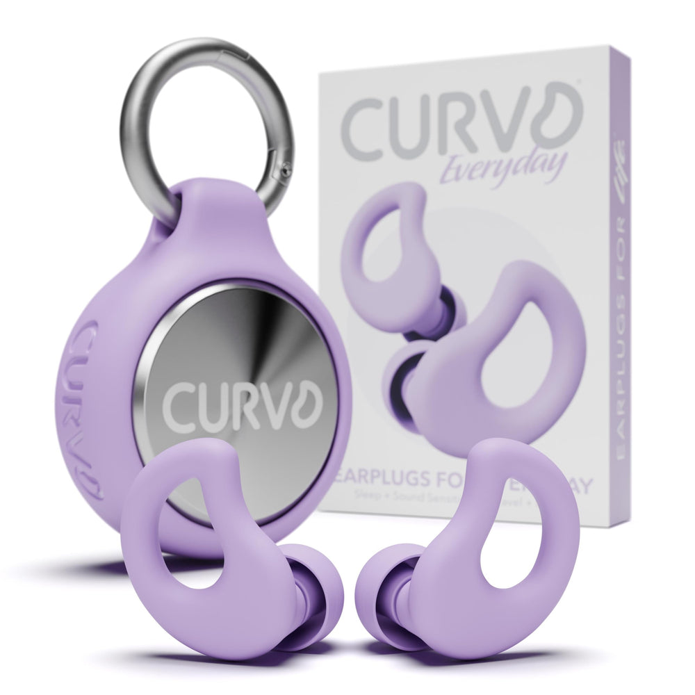 CURVD empaque frontal morado mostrando tapones y accesorios para protección cómoda