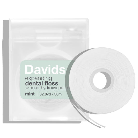 Davids dispensador frontal mostrando diseño recargable y fácil apertura