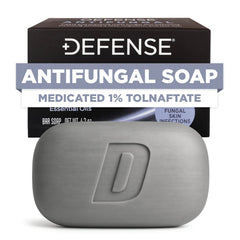 Defense Soap envase frontal mostrando la barra y beneficios de limpieza
