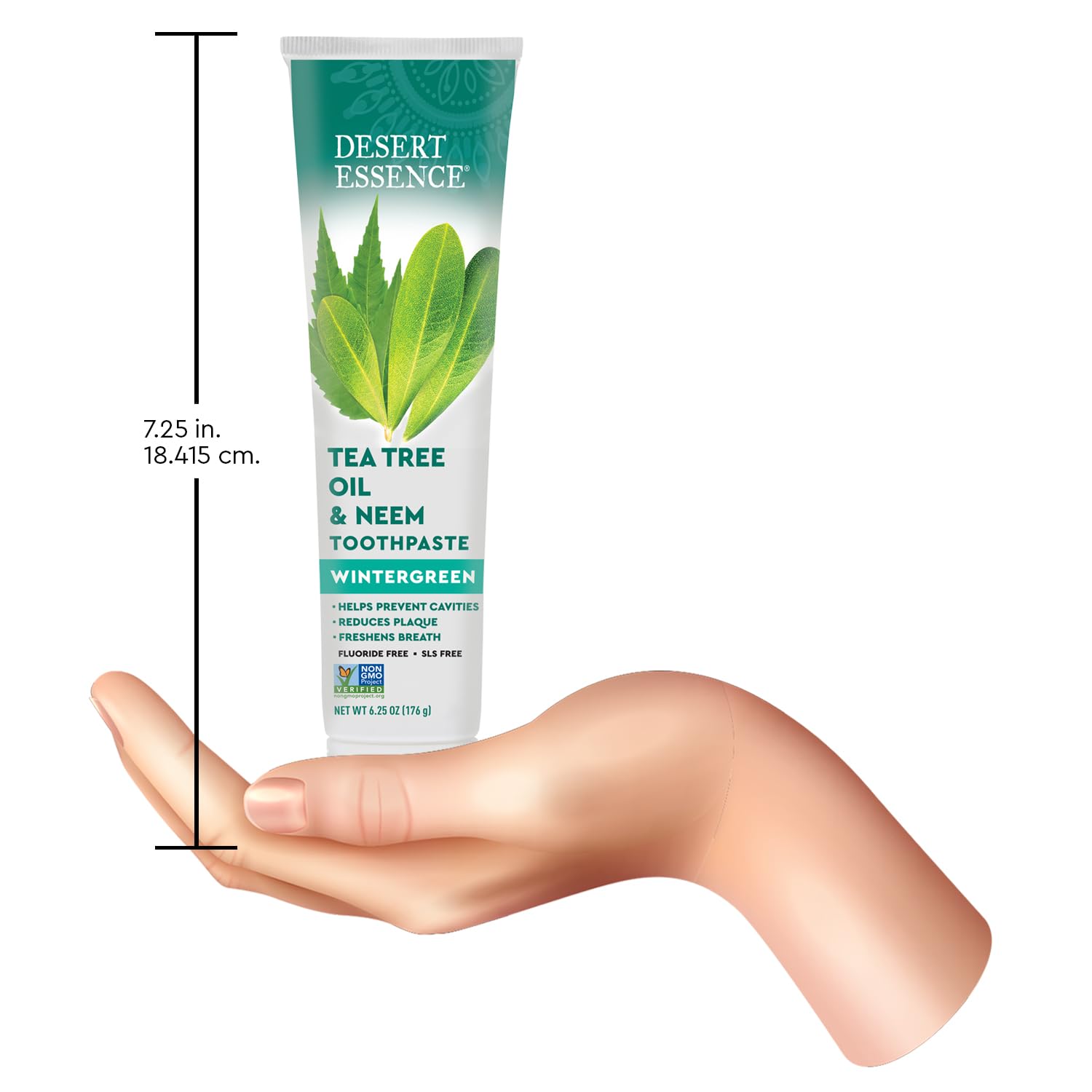 Desert Essence tubo apoyado junto a regla para mostrar tamaño de 6.25 oz por tubo