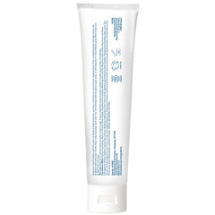 Desert Essence persona cepillando dientes, beneficio: sensación fresca y limpieza diaria