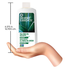 Etiqueta de Desert Essence en primer plano con ingredientes botánicos visibles y certificaciones