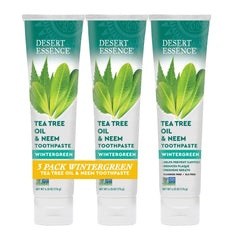 Desert Essence frente del paquete pack de tres tubos mostrando marca y sabor wintergreen