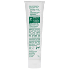 Desert Essence tubo en mano para comparar tamaño, muestra 6.25 oz y escala real