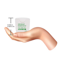 Desert Essence primer plano de la cinta dental con textura gruesa beneficiosa