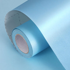 Donyang rollo frente mostrando color azul cielo y ancho, ideal para regalos