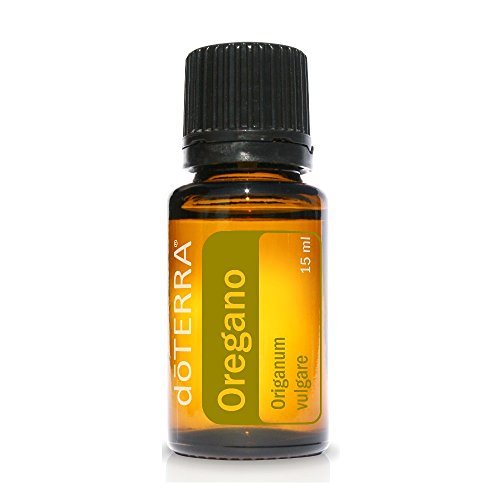 doTERRA gota de aceite de orégano en superficie que destaca pureza y potencia