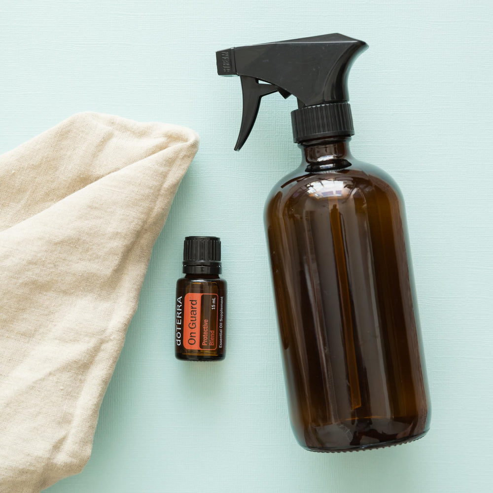 doTERRA On Guard usado en limpiador casero sobre encimera limpia