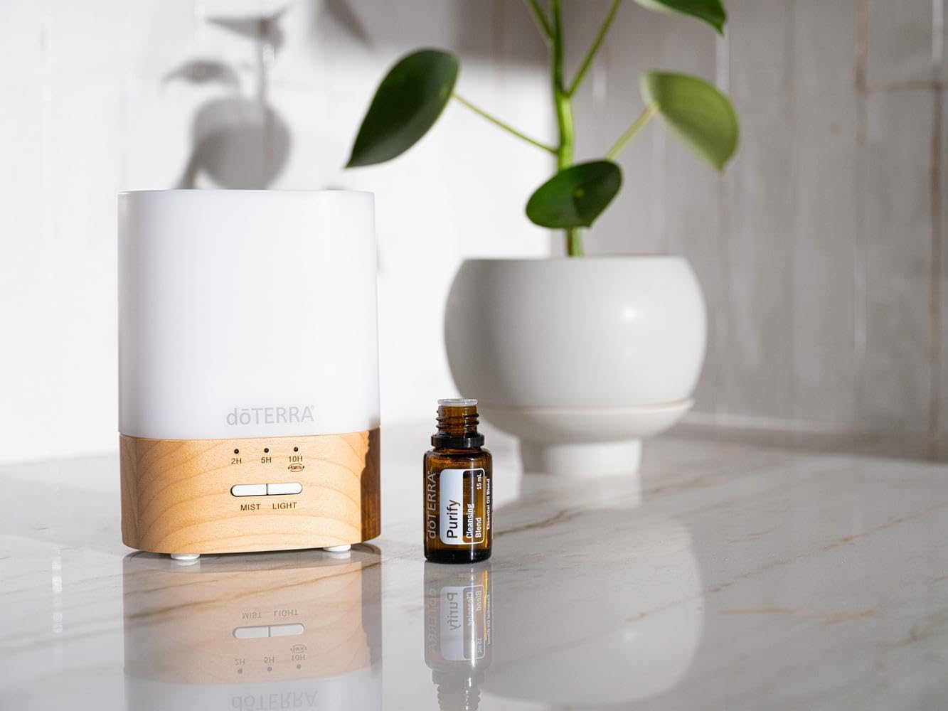 doTERRA Purify ambientando un salón mostrando beneficio de frescura
