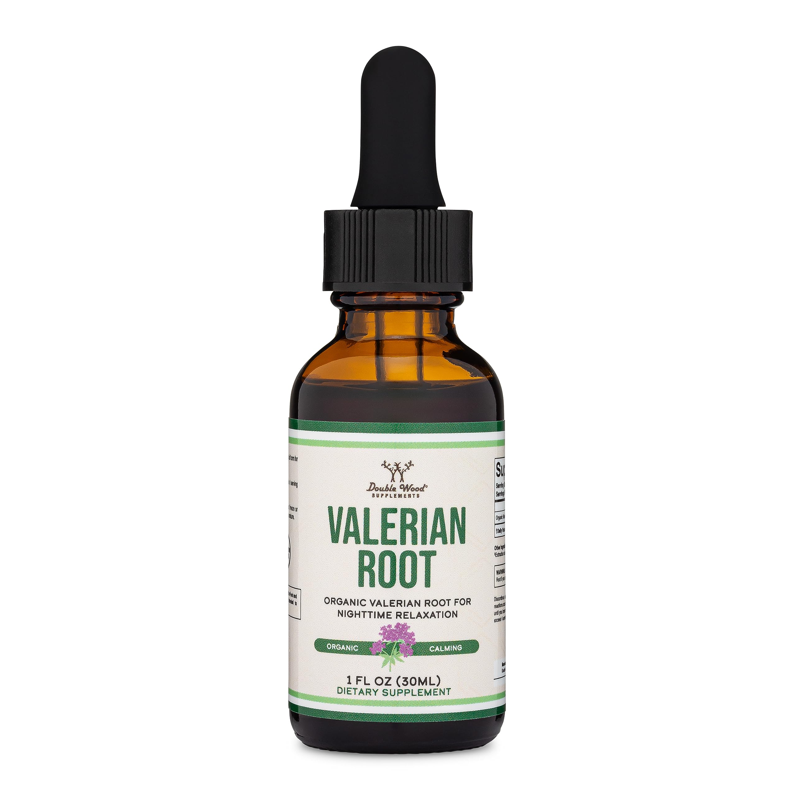 Botella Double Wood junto a una cinta métrica para comparar el tamaño compacto de 1 oz